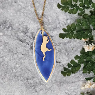 Cobalt blue fine ceramic porcelain designer necklace - embossed plant with 22k gold plating and cat pendant