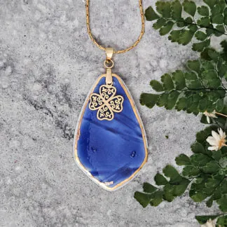 Cobalt blue fine ceramic porcelain designer necklace - embossed plant with 22k gold plating and clover pendant