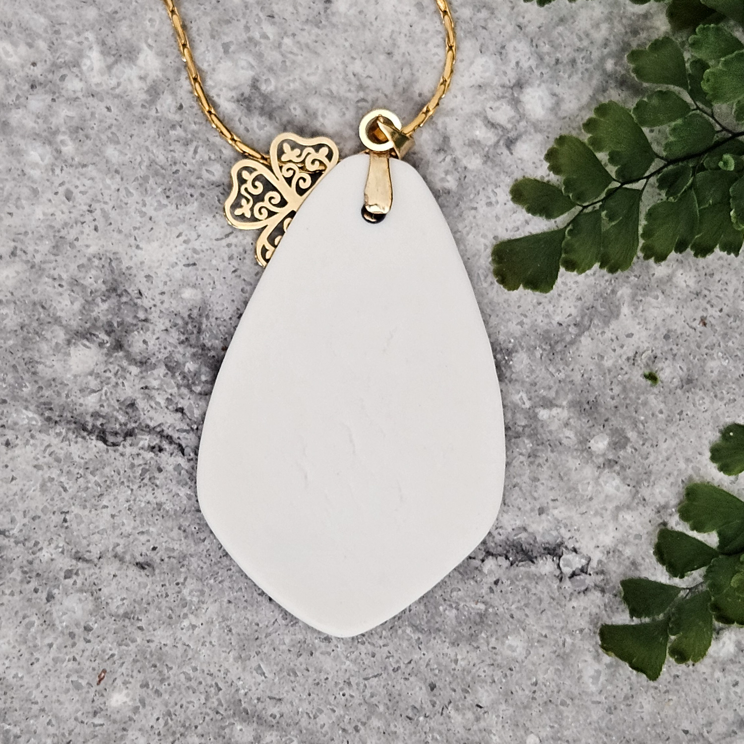 Cobalt blue fine ceramic porcelain designer necklace - embossed plant with 22k gold plating and clover pendant - Image 3