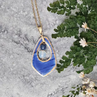 Cobalt blue fine ceramic porcelain designer necklace - embossed plant with 22k gold plating, dumortierite, and opal