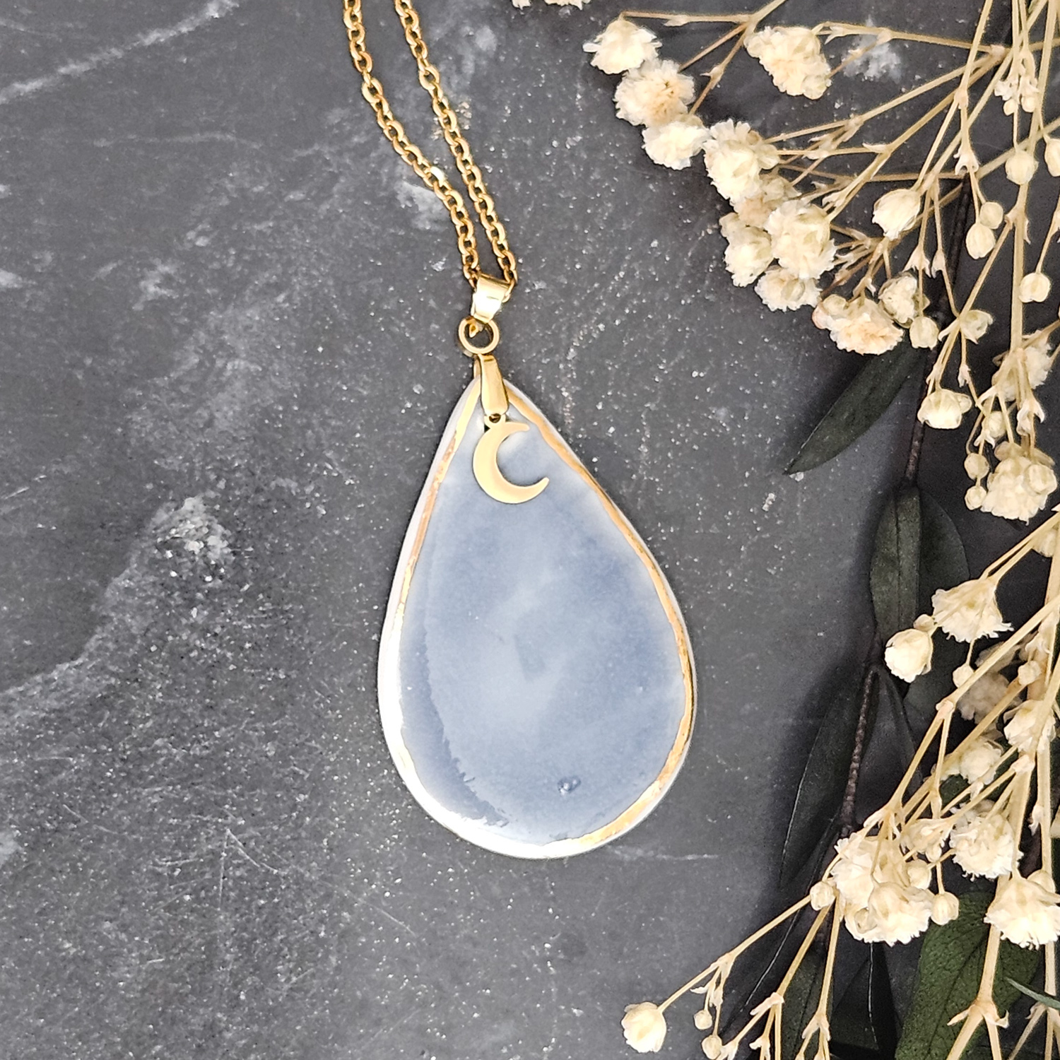 Cobalt blue fine ceramic porcelain designer necklace - embossed plant with 22k gold plating and moon pendant