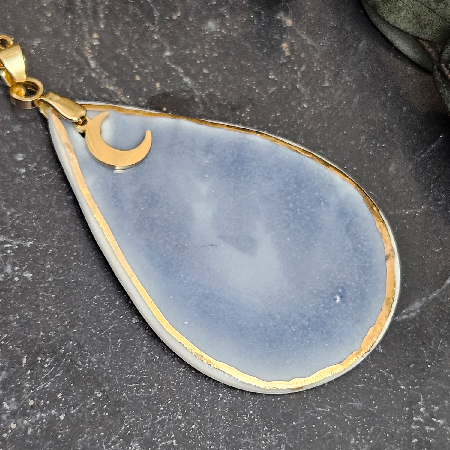 Cobalt blue fine ceramic porcelain designer necklace - embossed plant with 22k gold plating and moon pendant - Image 2