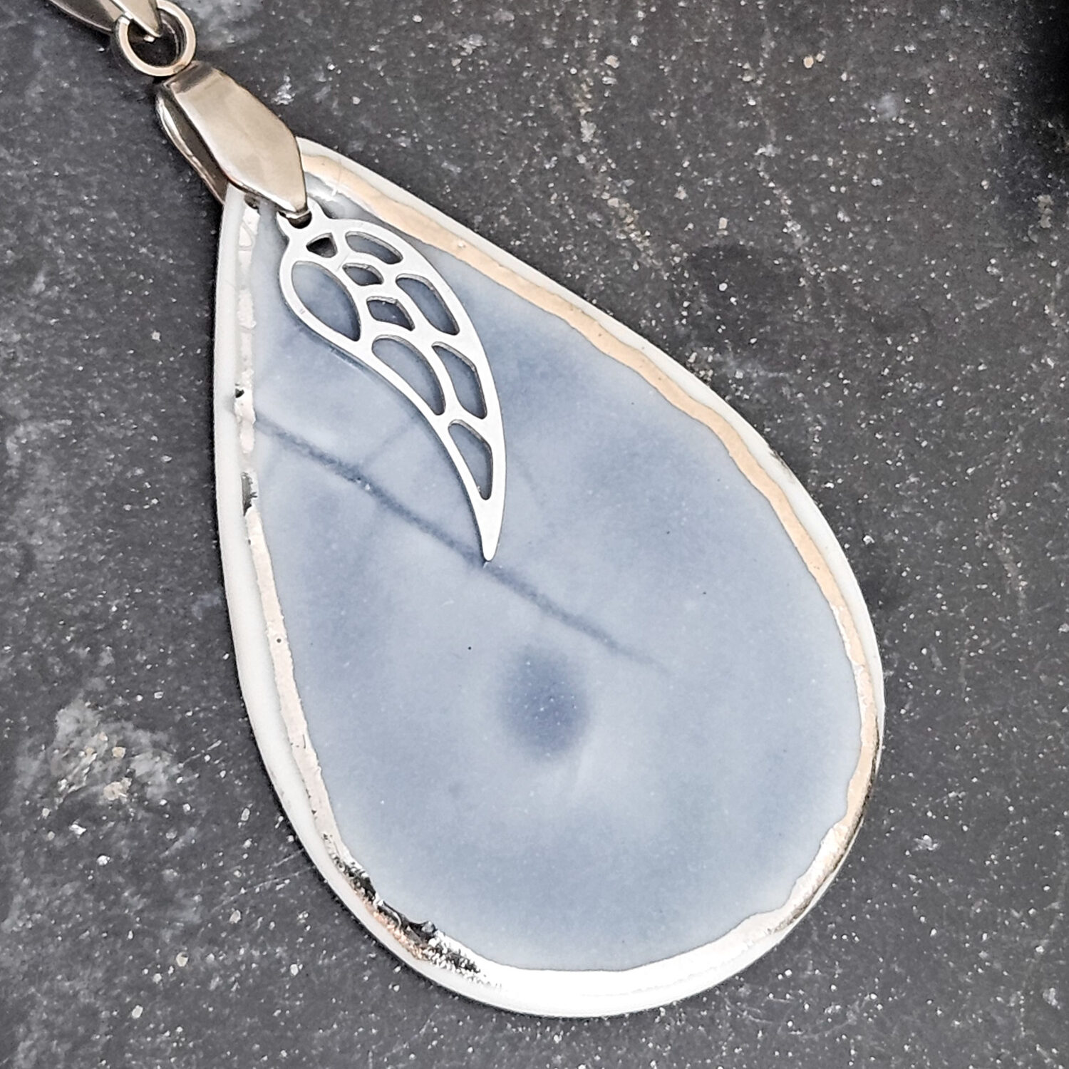 Cobalt blue fine ceramic porcelain designer necklace - embossed plant with silver accents (white gold) and wing pendant - Image 2