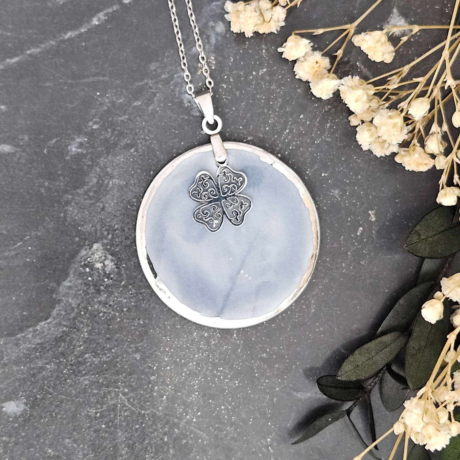 Cobalt blue fine ceramic porcelain designer necklace - embossed plant with silver accents (white gold) and clover pendant