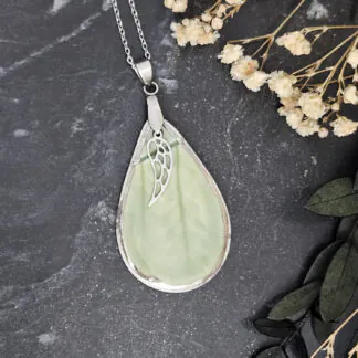 Emerald green fine ceramic porcelain designer necklace - embossed plant with silver accents (white gold) and wing pendant