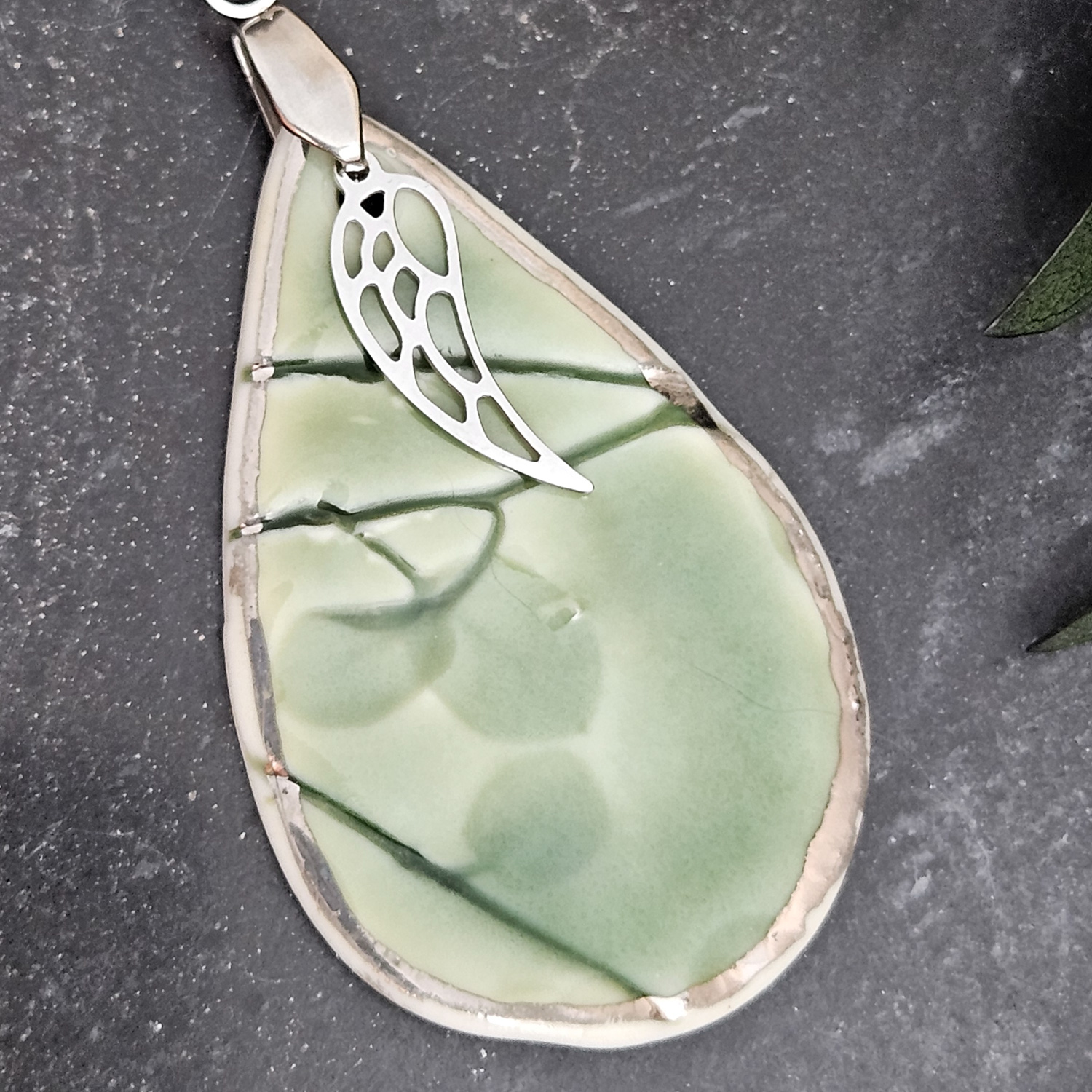 Emerald green fine ceramic porcelain designer necklace - embossed plant with silver accents (white gold) and wing pendant - Image 2
