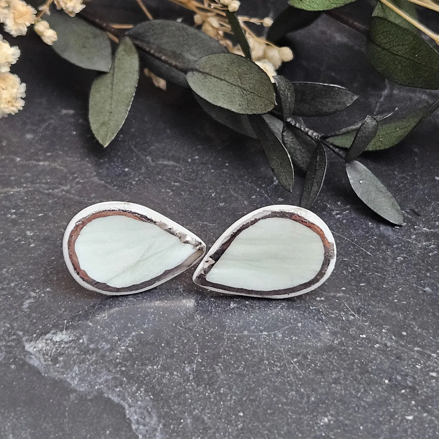 Light blue fine ceramic porcelain hypoallergenic stud designer earrings for sensitive ears with silver accents (white gold) - embossed plant