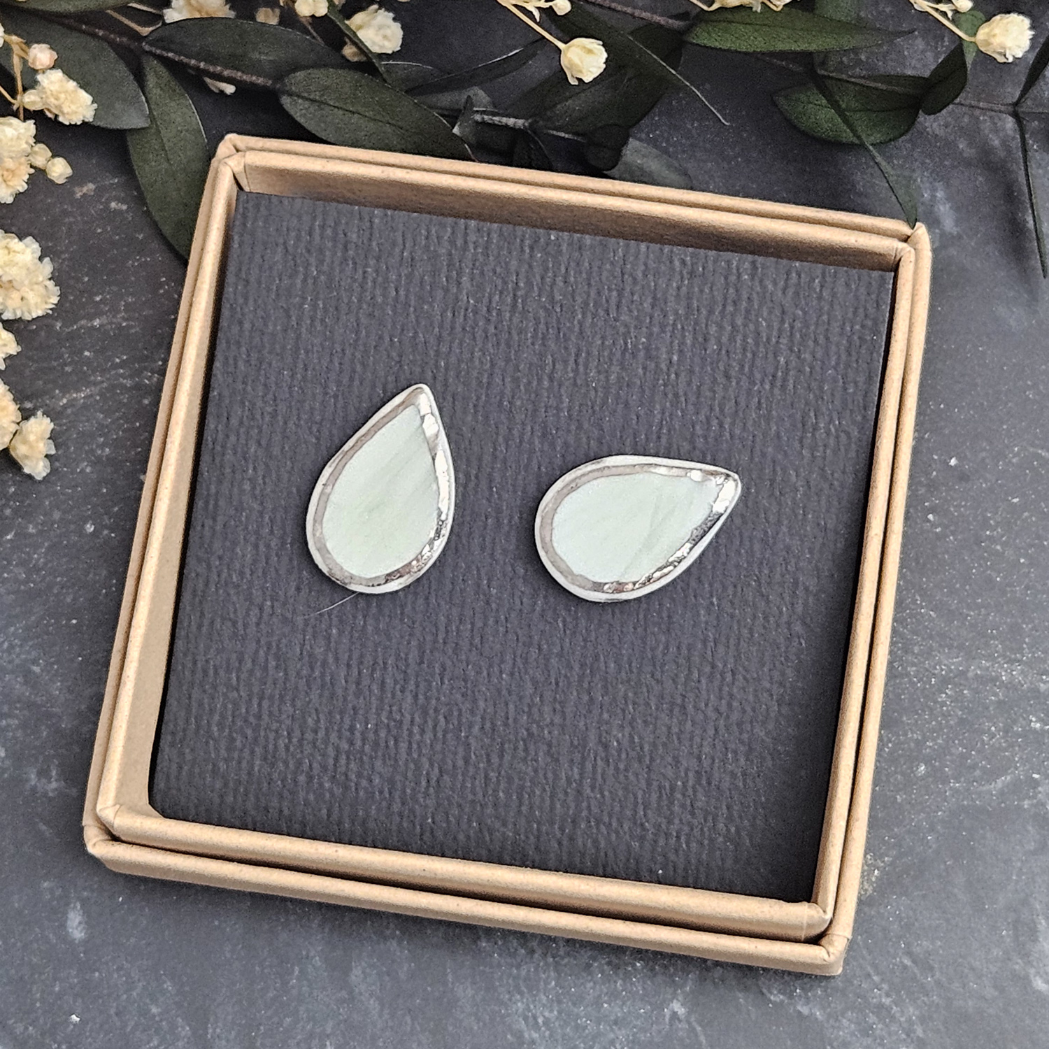 Light blue fine ceramic porcelain hypoallergenic stud designer earrings for sensitive ears with silver accents (white gold) - embossed plant - obrazek 4