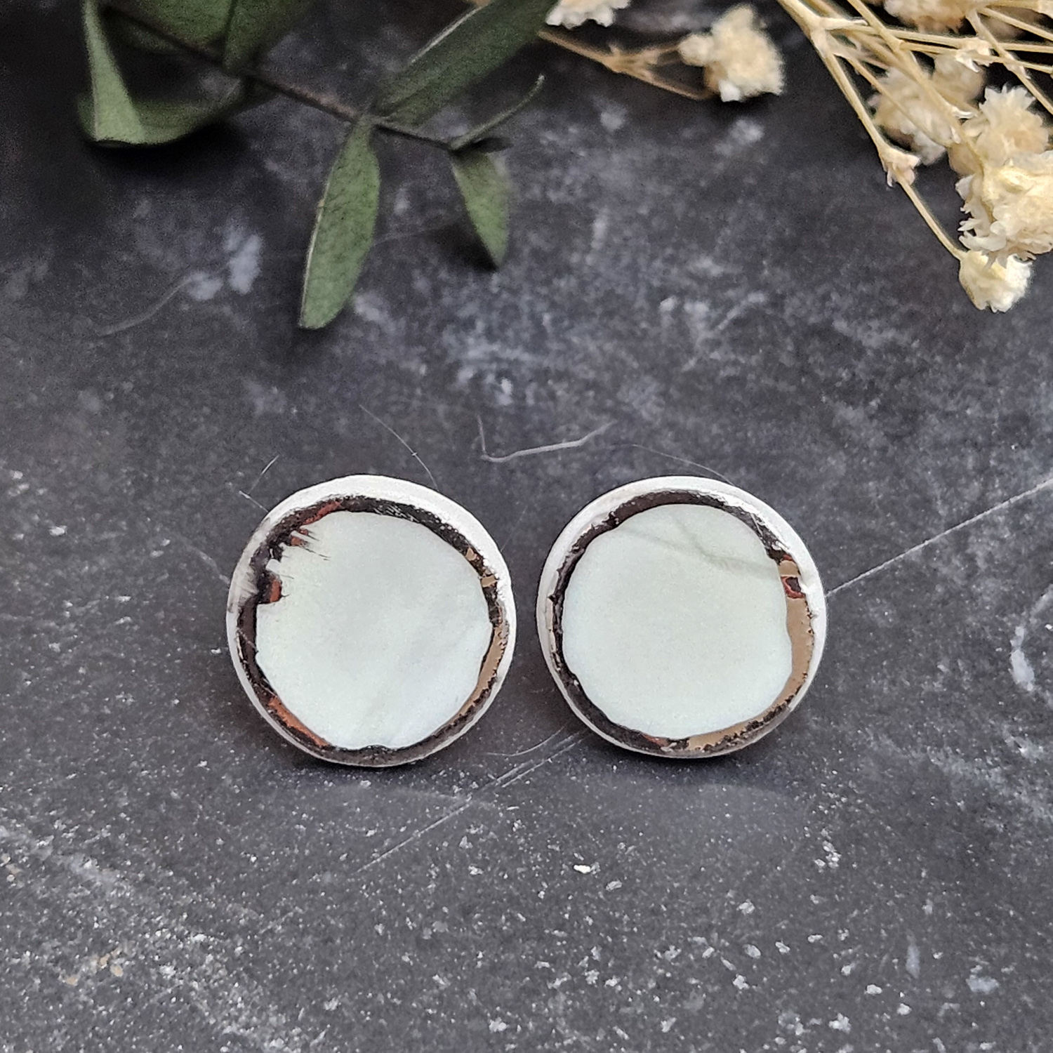 Light blue fine ceramic porcelain hypoallergenic stud designer earrings for sensitive ears with silver accents (white gold) - embossed plant