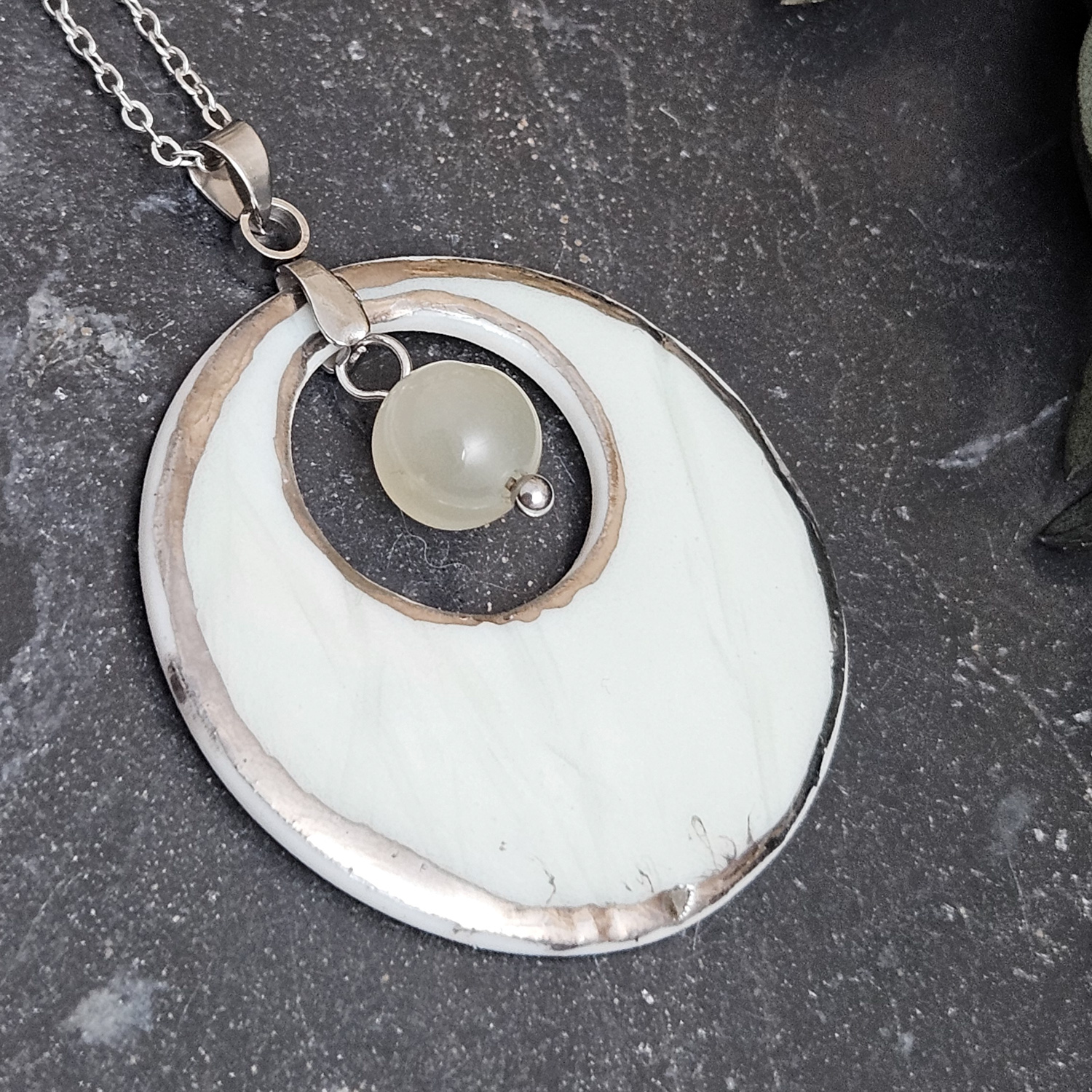 Light blue fine ceramic porcelain designer necklace - embossed plant with silver accents (white gold) and moonstone - obrazek 2