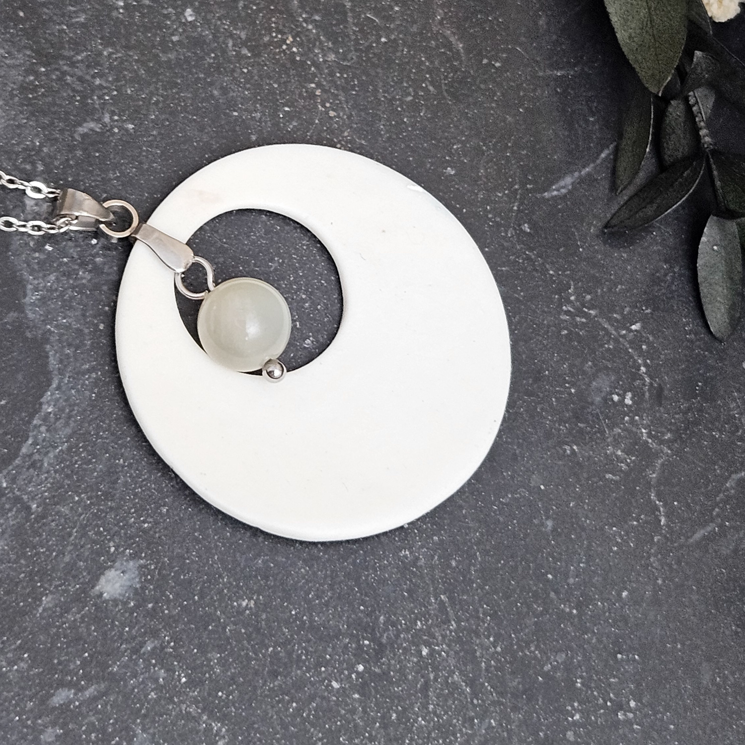 Light blue fine ceramic porcelain designer necklace - embossed plant with silver accents (white gold) and moonstone - obrazek 3