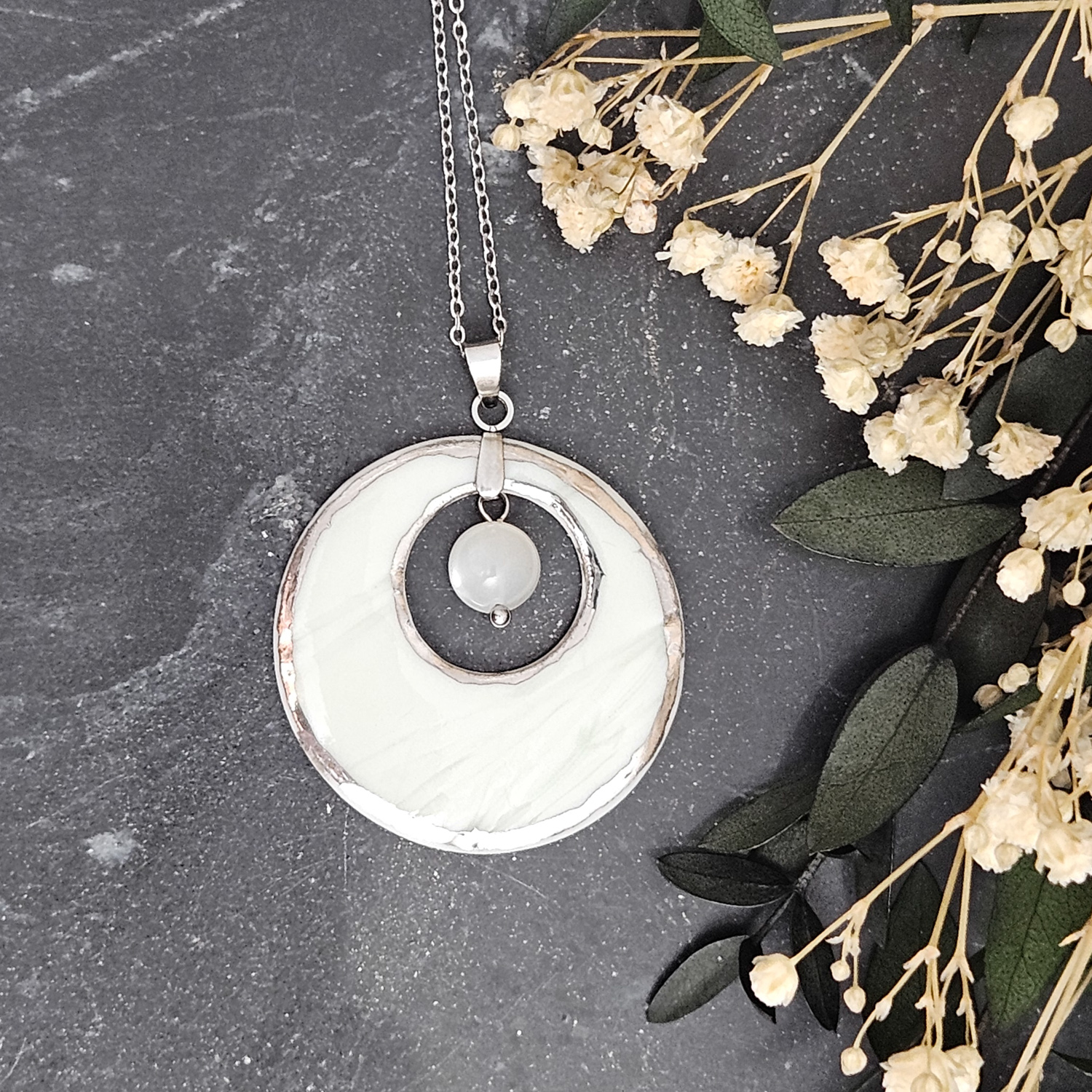 Light blue fine ceramic porcelain designer necklace - embossed plant with silver accents (white gold) and moonstone