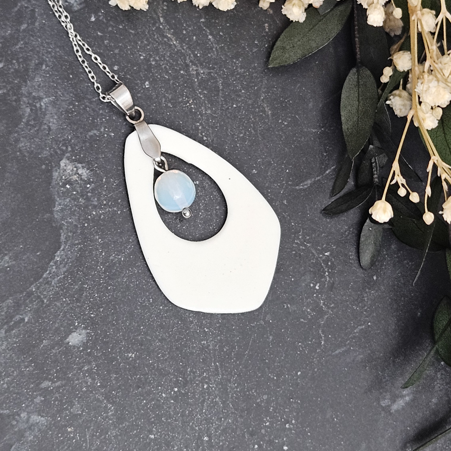 Light blue fine ceramic porcelain designer necklace - embossed plant with silver accents (white gold) and opal - obrazek 3