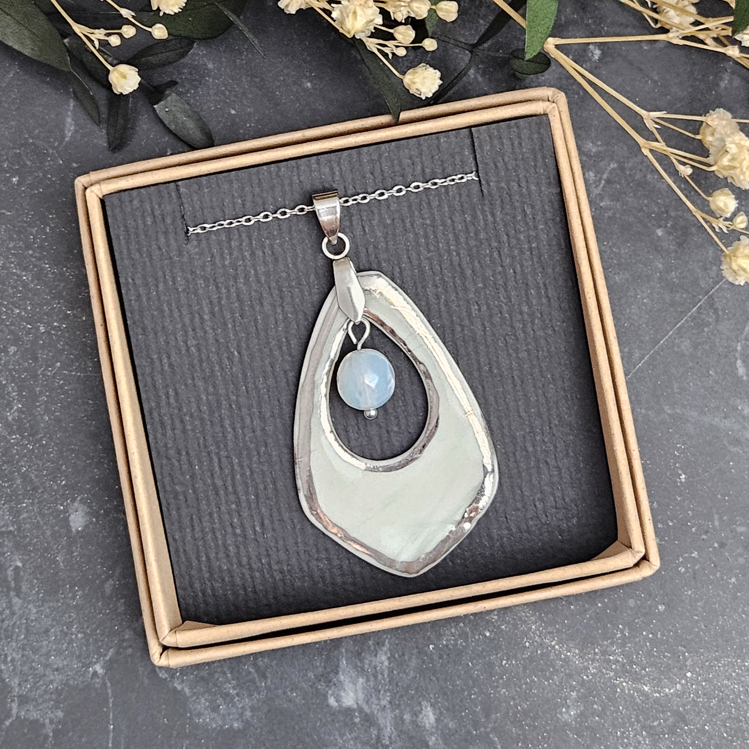 Light blue fine ceramic porcelain designer necklace - embossed plant with silver accents (white gold) and opal - obrazek 4