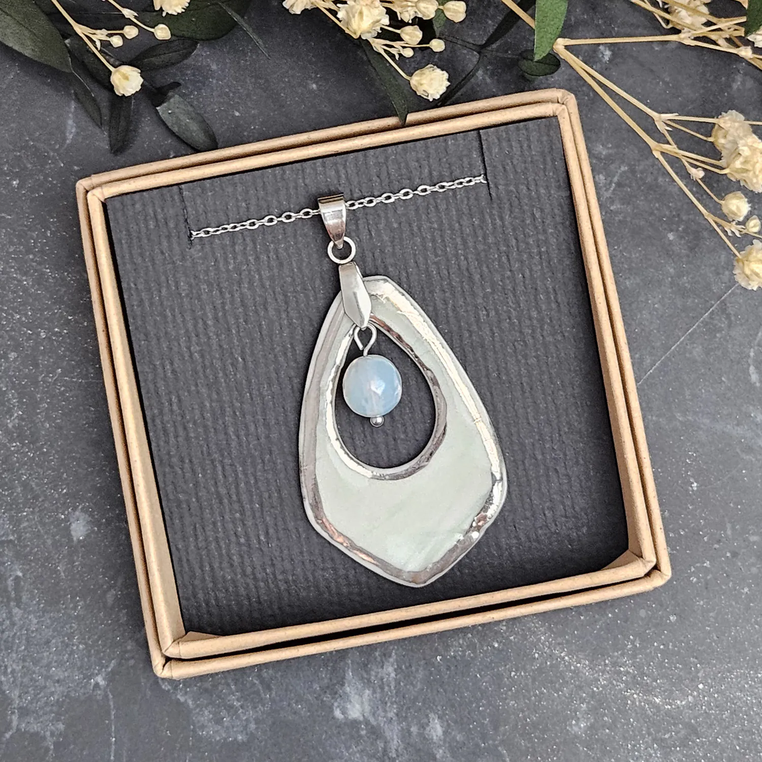 Light blue fine ceramic porcelain designer necklace - embossed plant with silver accents (white gold) and opal - Image 4