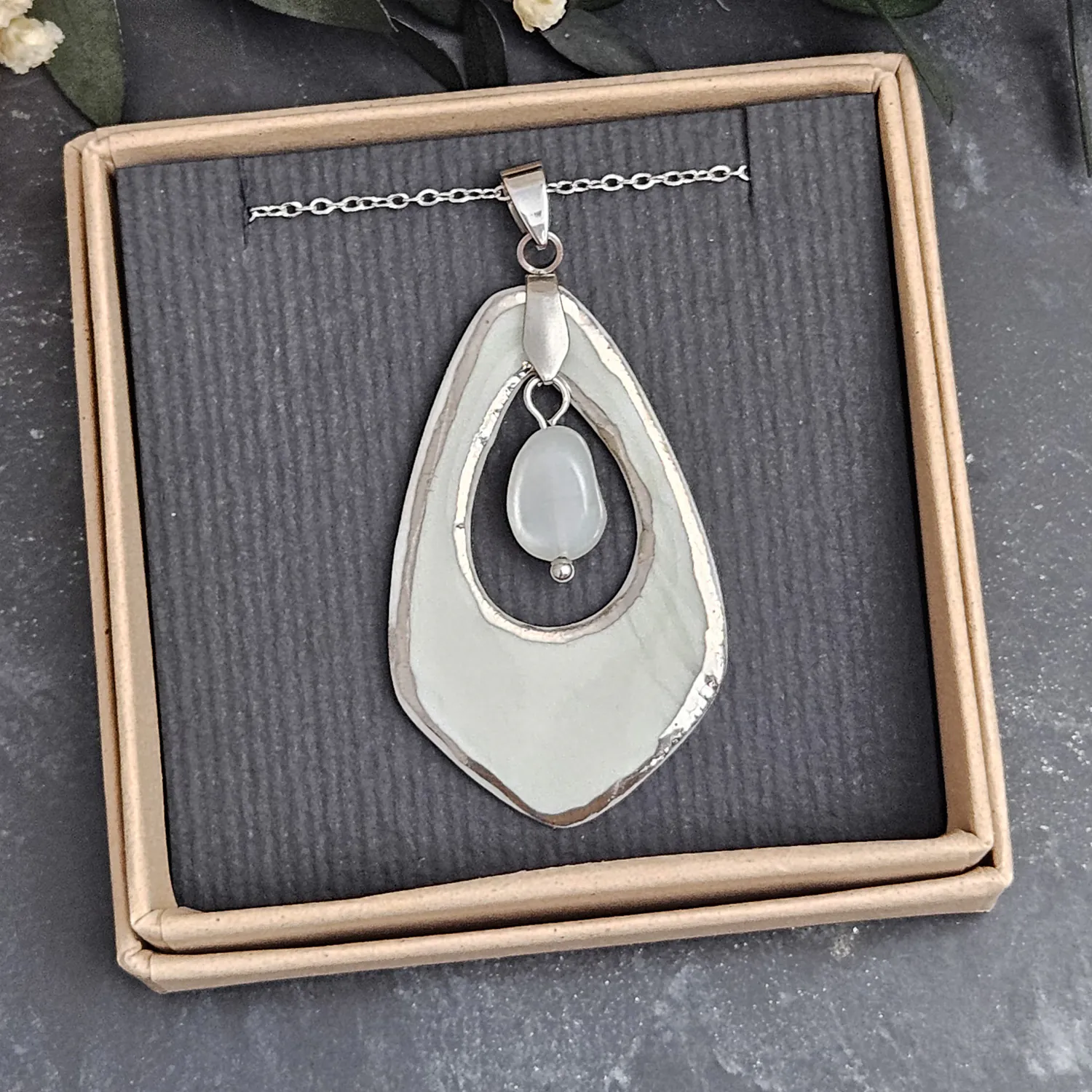 Light blue fine ceramic porcelain designer necklace - embossed plant with silver accents (white gold) and moonstone - Image 4