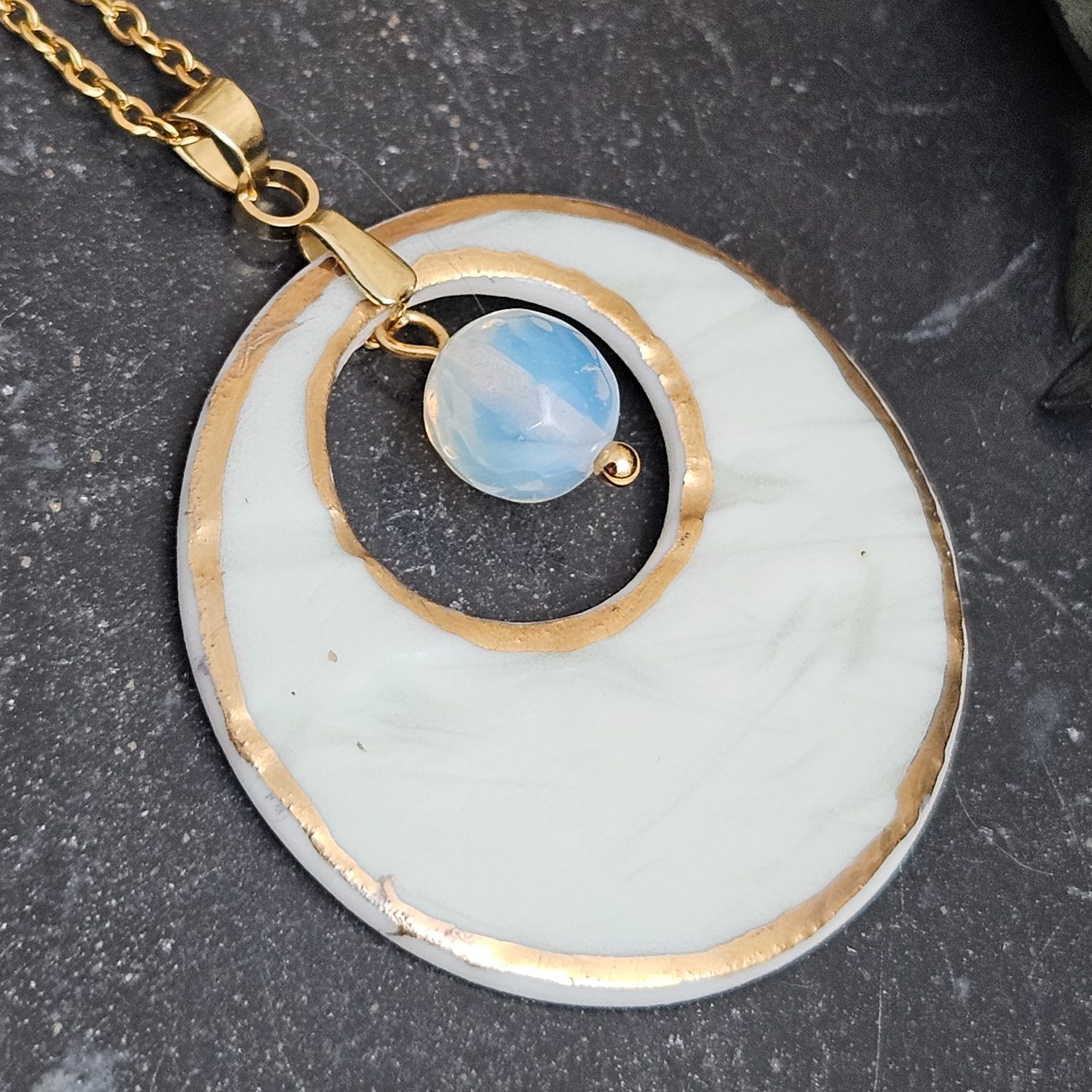Light blue fine ceramic porcelain designer necklace - embossed plant with 22k gold plating and opal - obrazek 2