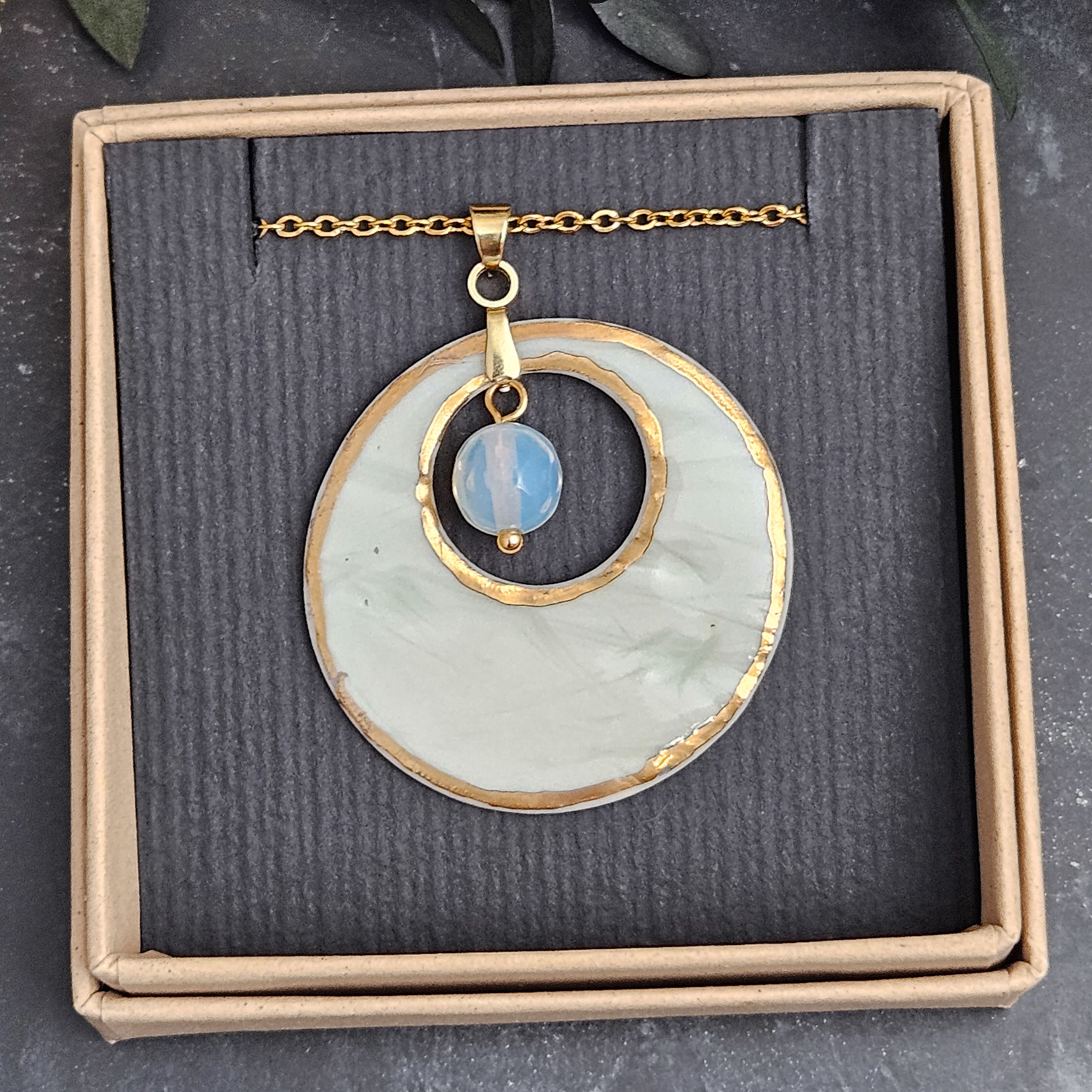 Light blue fine ceramic porcelain designer necklace - embossed plant with 22k gold plating and opal - obrazek 4