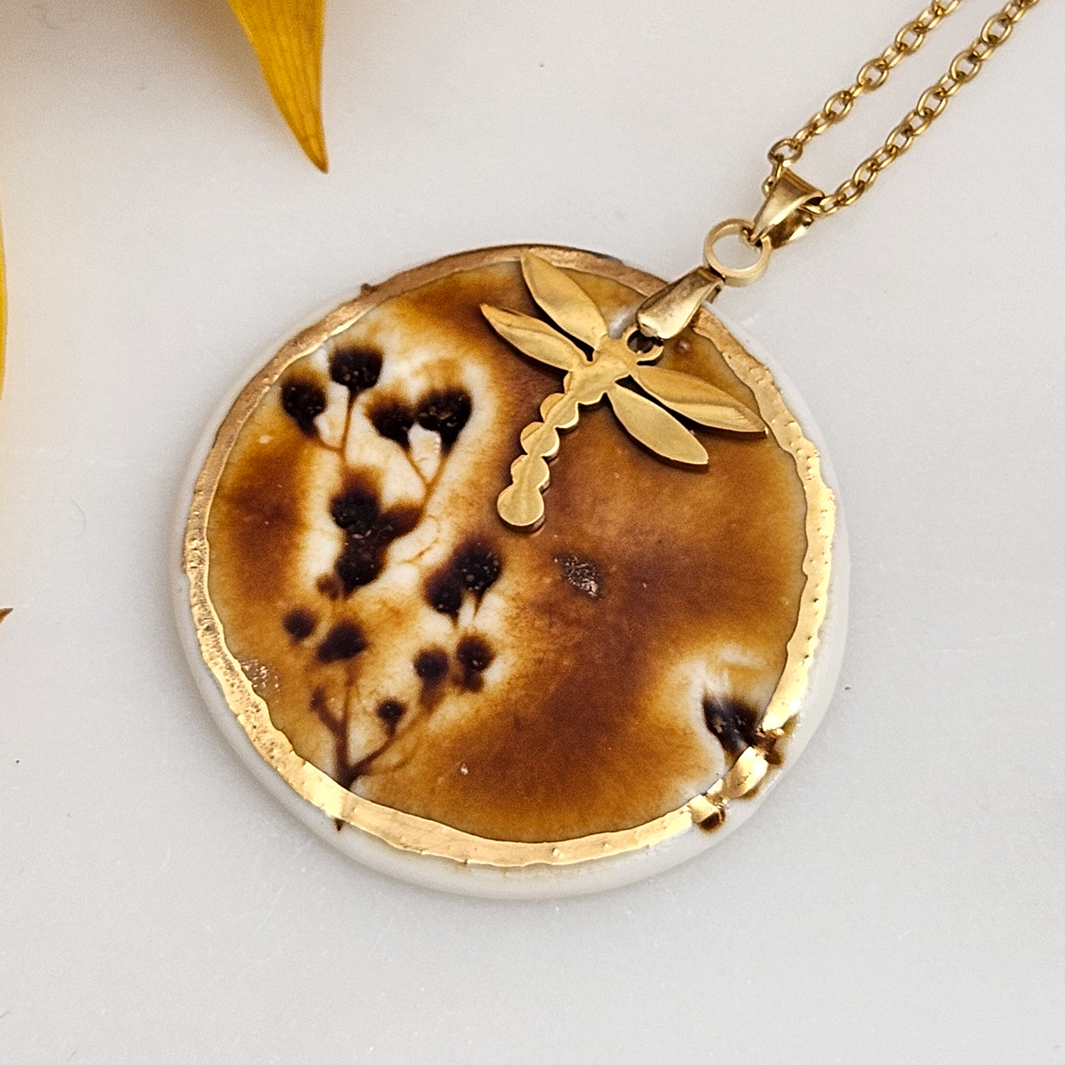 Amber fine ceramic porcelain designer necklace - embossed plant with 22k gold plating and dragonfly pendant - Image 2