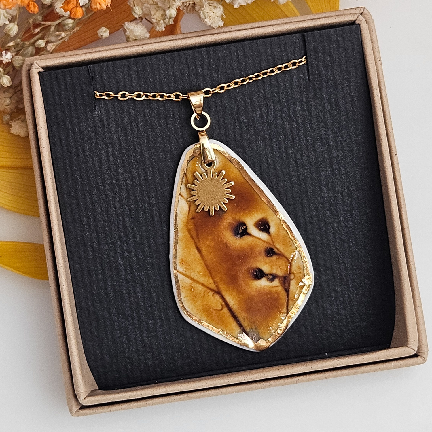 Amber fine ceramic porcelain designer necklace - embossed plant with 22k gold plating and sun pendant - Image 4