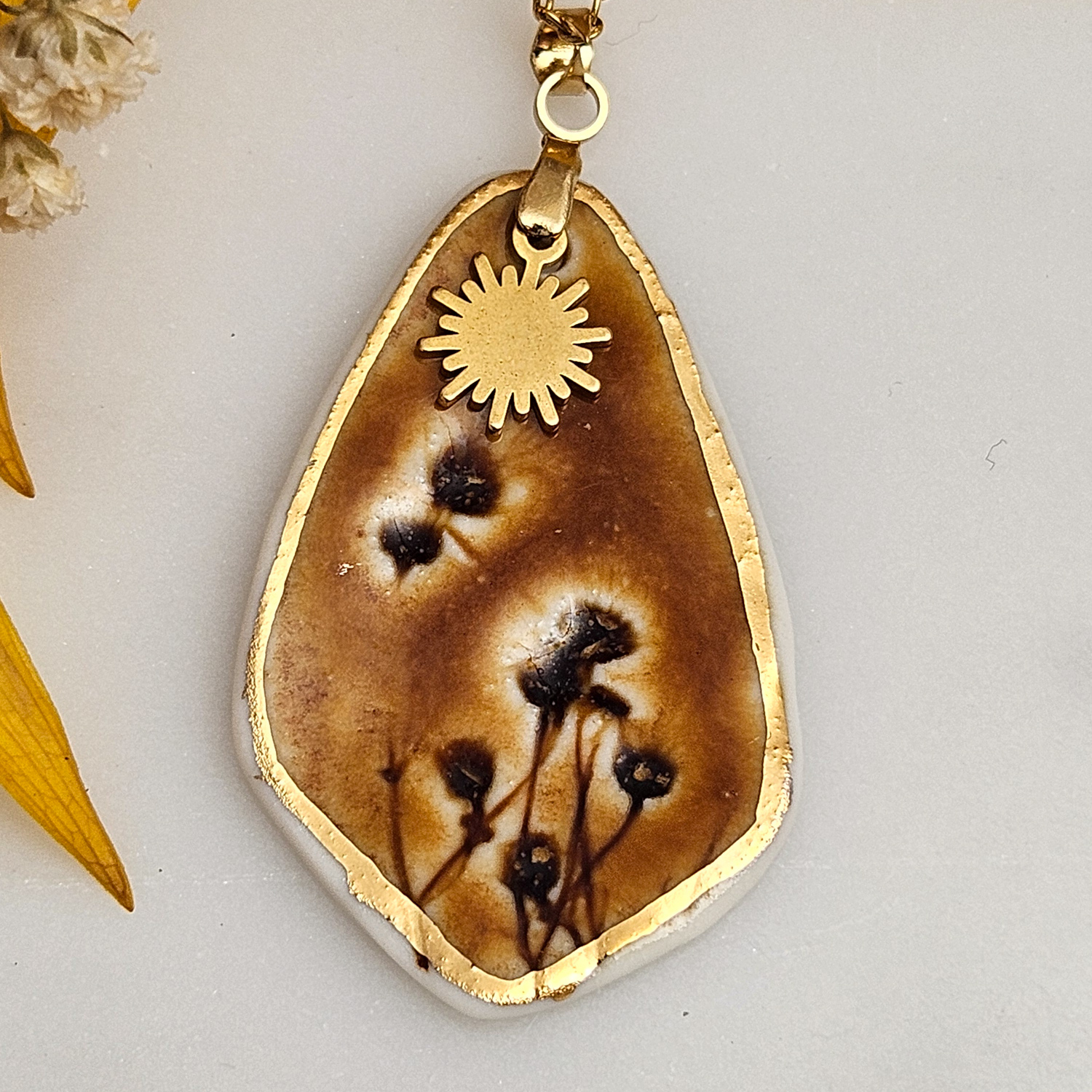 Amber fine ceramic porcelain designer necklace - embossed plant with 22k gold plating and sun pendant - Image 2