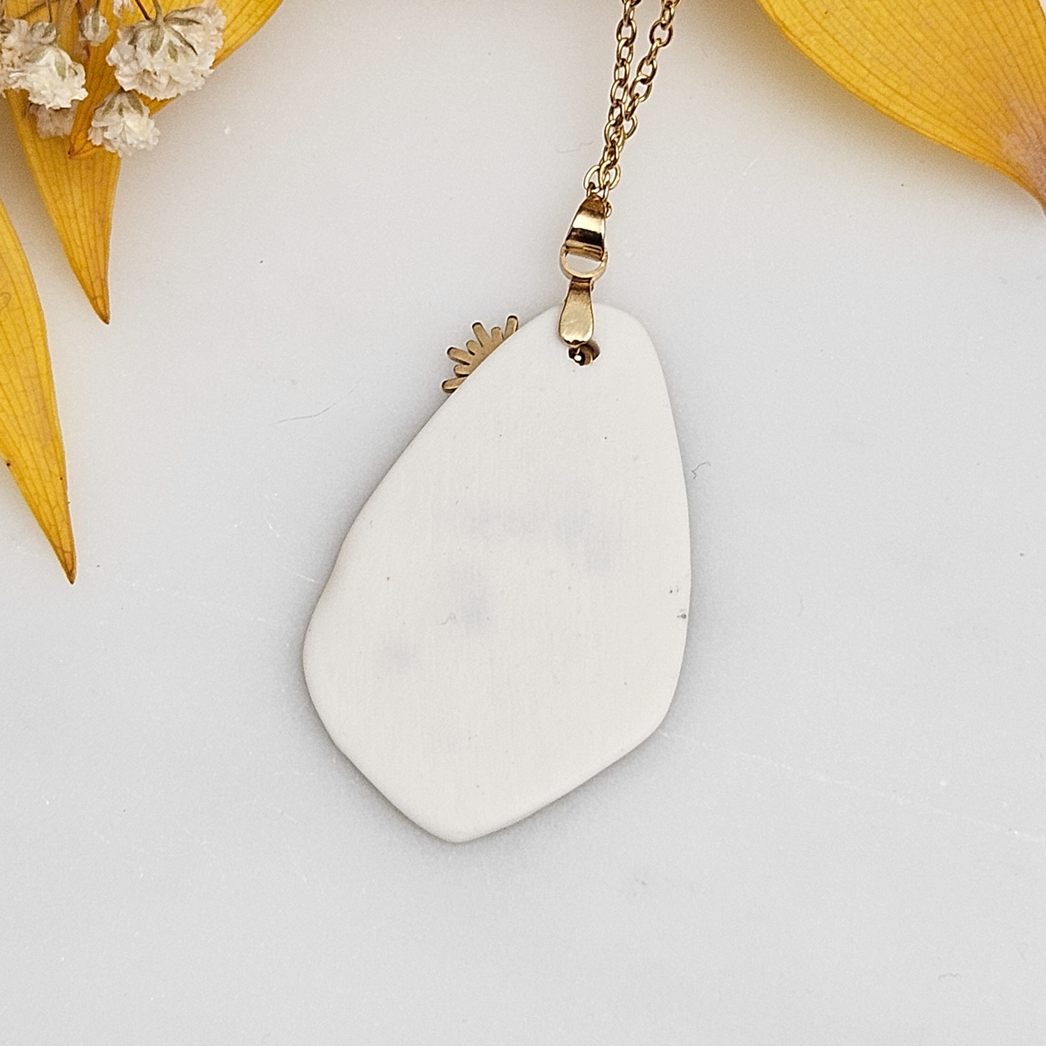 Amber fine ceramic porcelain designer necklace - embossed plant with 22k gold plating and sun pendant - Image 3