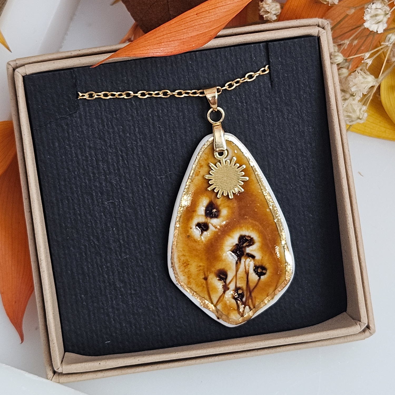 Amber fine ceramic porcelain designer necklace - embossed plant with 22k gold plating and sun pendant - Image 4