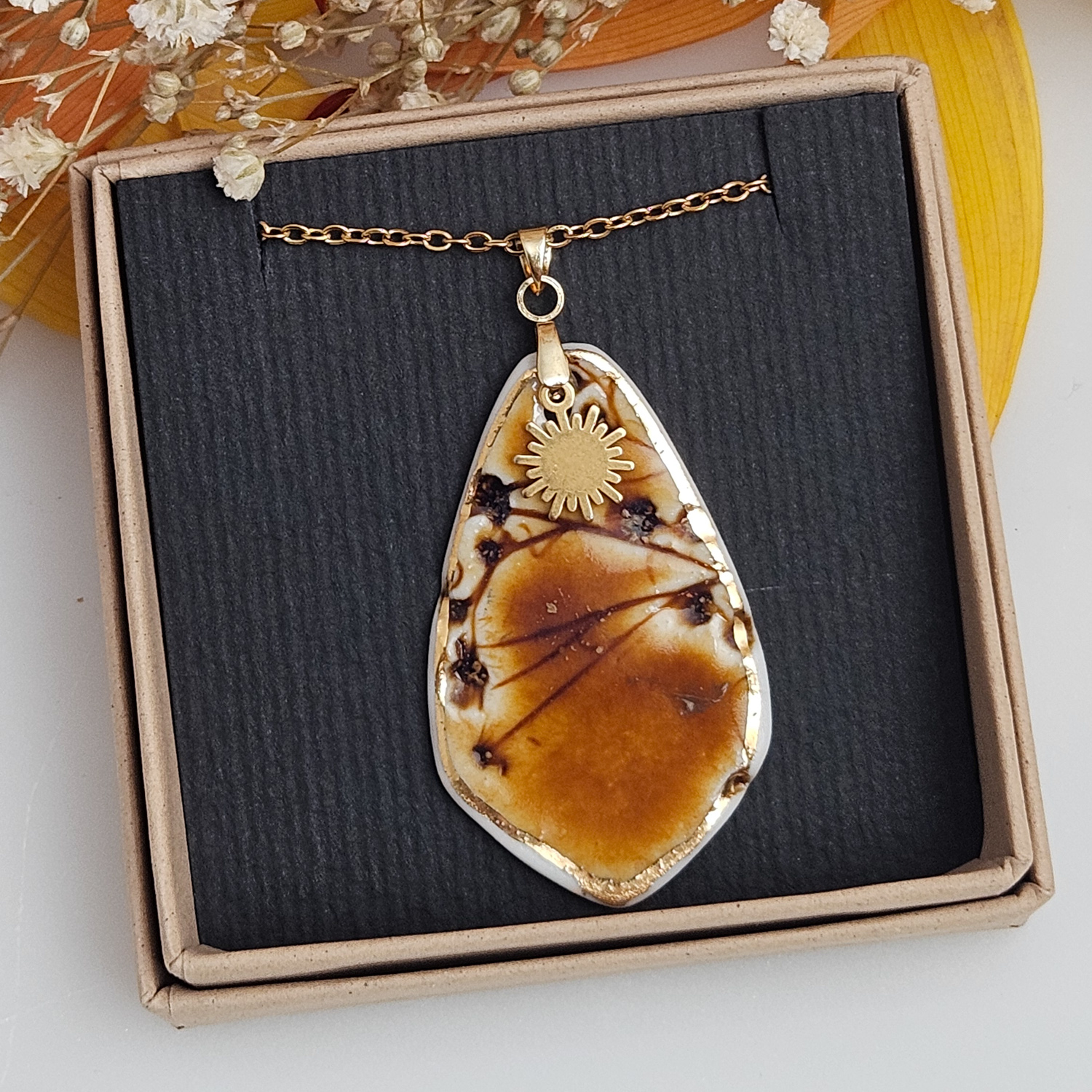 Amber fine ceramic porcelain designer necklace - embossed plant with 22k gold plating and sun pendant - Image 4