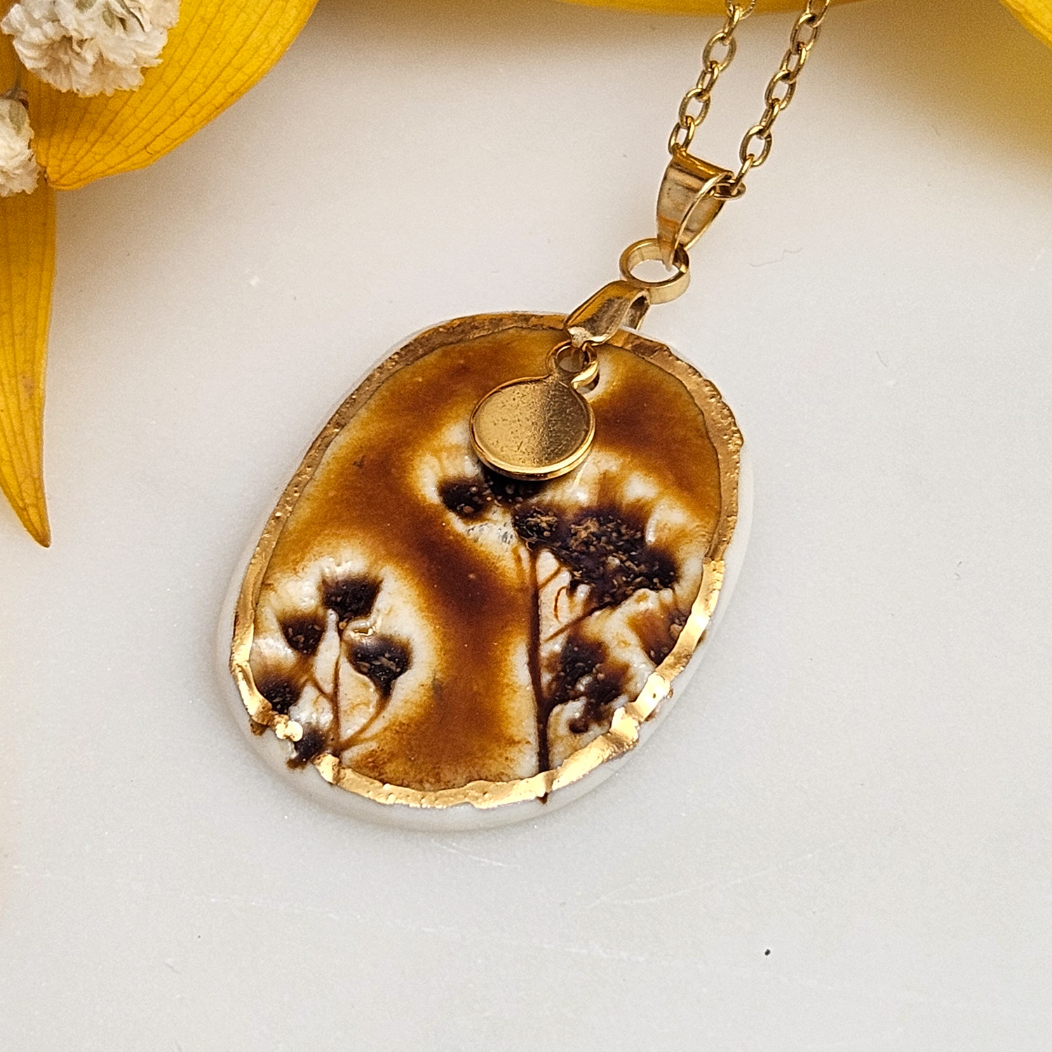 Amber fine ceramic porcelain designer necklace - embossed plant with 22k gold plating and round pendant - Image 2