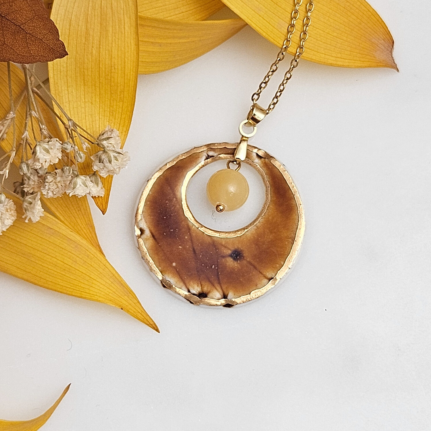 Amber fine ceramic porcelain designer necklace - embossed plant with 22k gold plating and amber nephrite