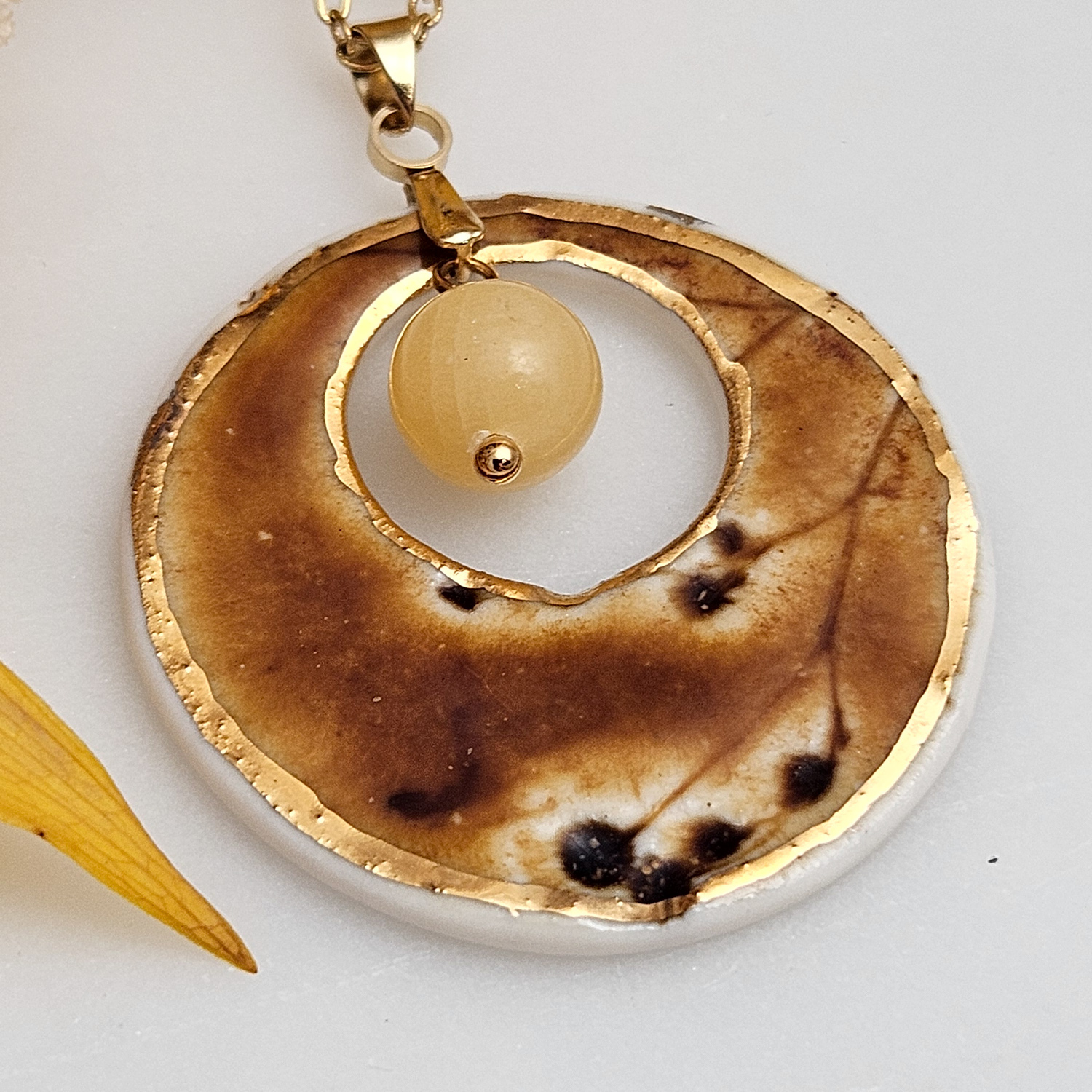 Amber fine ceramic porcelain designer necklace - embossed plant with 22k gold plating and amber nephrite - Image 2