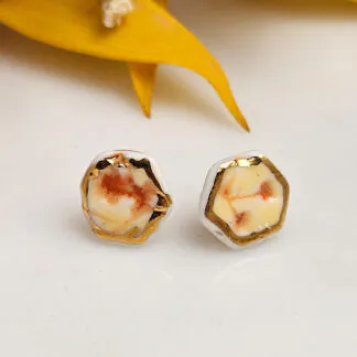 Yellow-red fine ceramic porcelain hypoallergenic stud designer earrings for sensitive ears with 22k gold plating - embossed plant