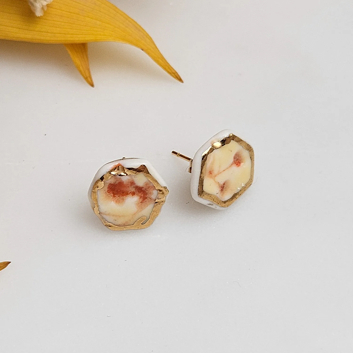Yellow-red fine ceramic porcelain hypoallergenic stud designer earrings for sensitive ears with 22k gold plating - embossed plant - Image 2