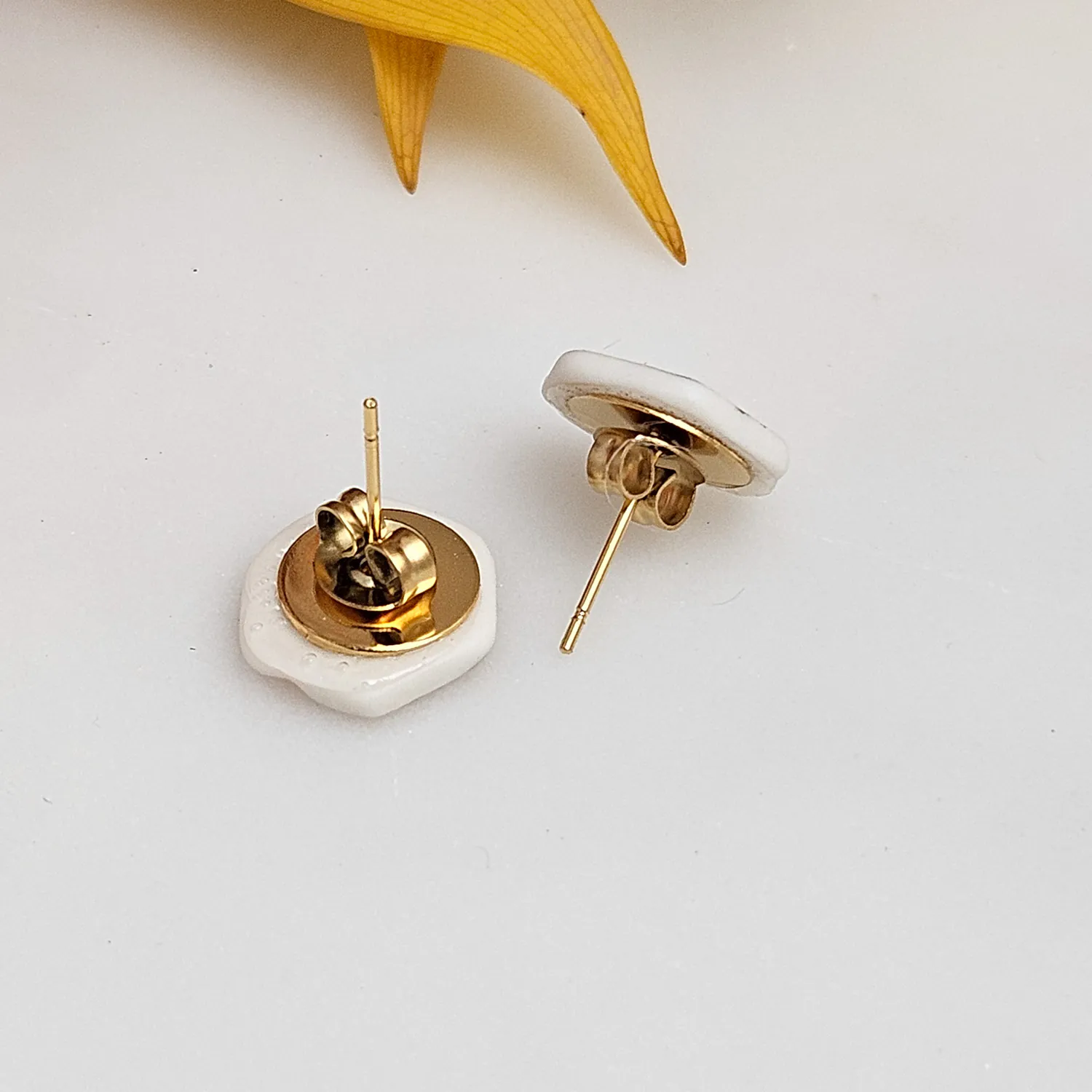 Yellow-red fine ceramic porcelain hypoallergenic stud designer earrings for sensitive ears with 22k gold plating - embossed plant - Image 3
