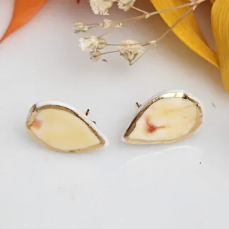 Yellow-red fine ceramic porcelain hypoallergenic stud designer earrings for sensitive ears with 22k gold plating - embossed plant