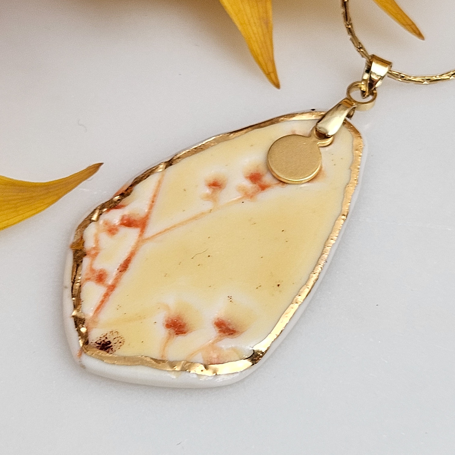 Yellow-red fine ceramic porcelain designer necklace - embossed plant with 22k gold plating and round pendant - Image 2