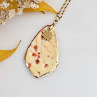 Yellow-red fine ceramic porcelain designer necklace - embossed plant with 22k gold plating and sun pendant