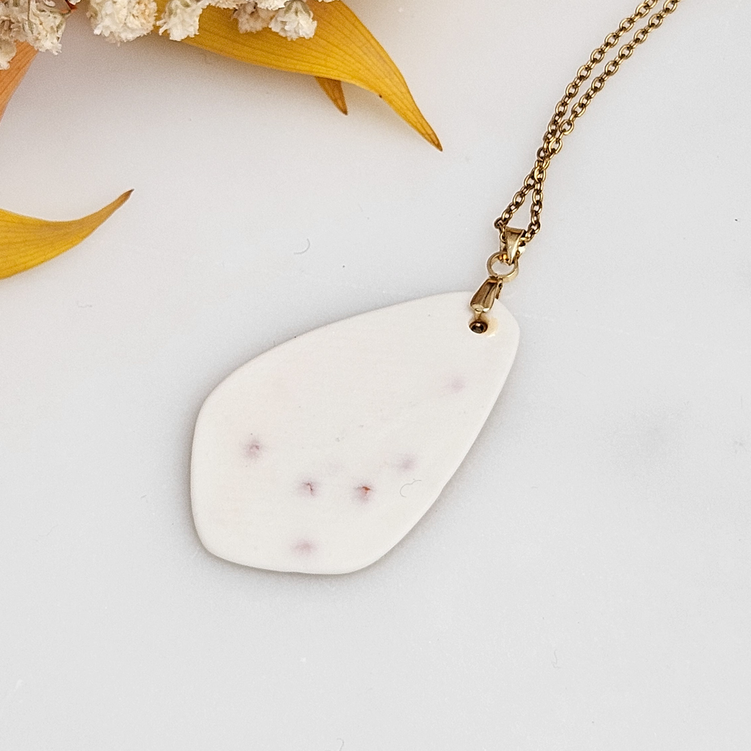 Yellow-red fine ceramic porcelain designer necklace - embossed plant with 22k gold plating and sun pendant - Image 3
