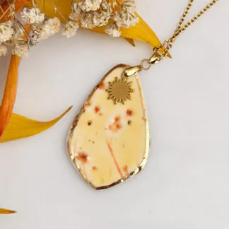 Yellow-red fine ceramic porcelain designer necklace - embossed plant with 22k gold plating and sun pendant