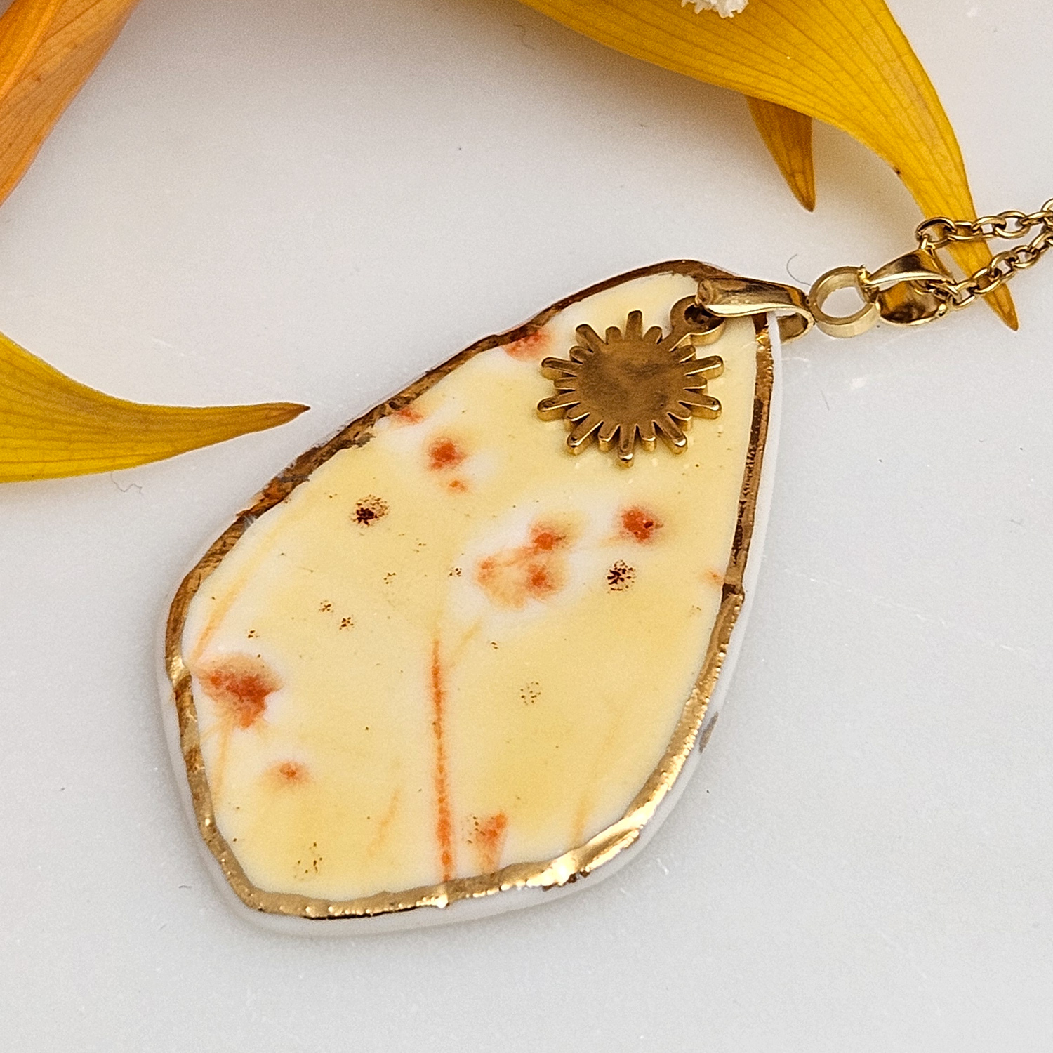 Yellow-red fine ceramic porcelain designer necklace - embossed plant with 22k gold plating and sun pendant - Image 2