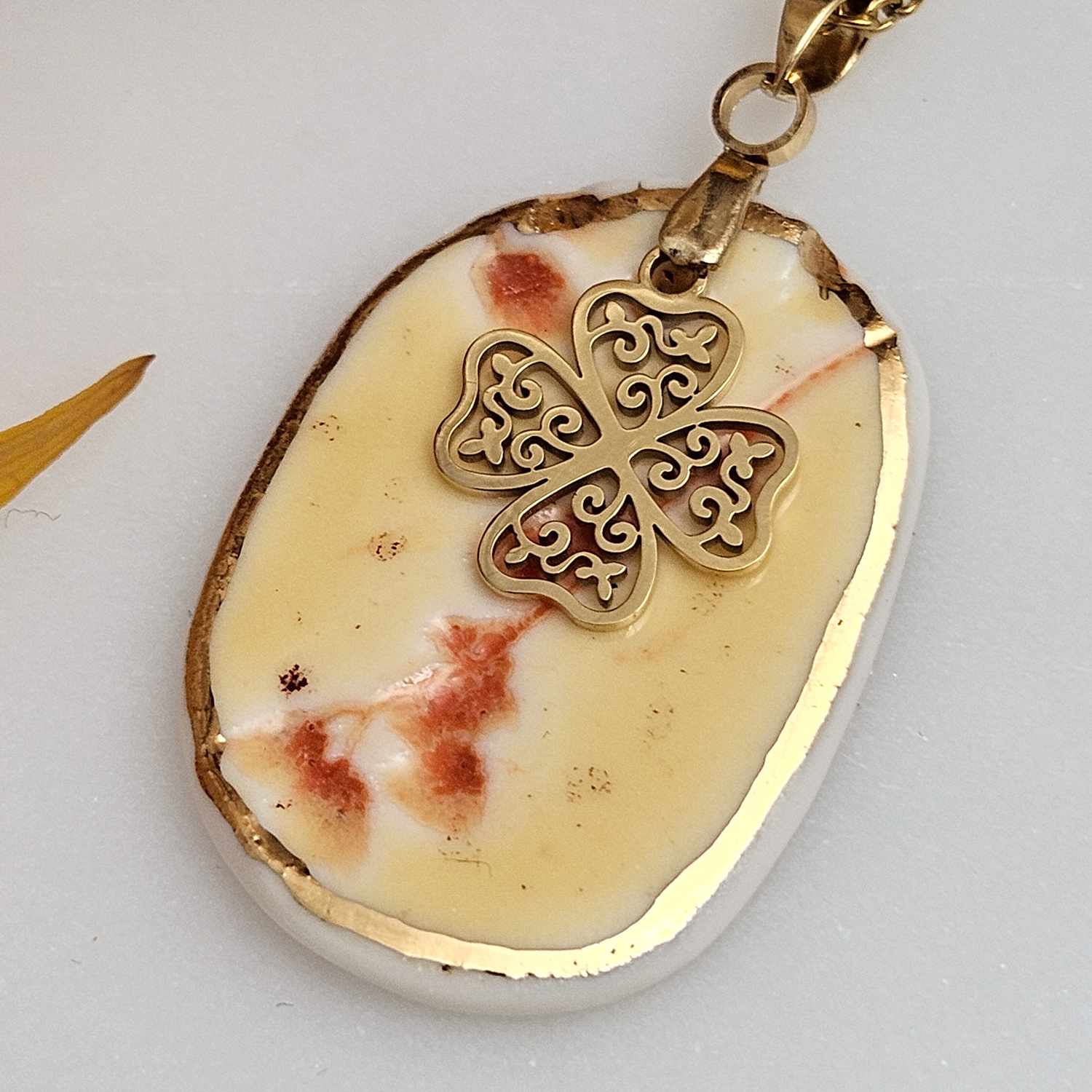 Yellow-red fine ceramic porcelain designer necklace - embossed plant with 22k gold plating and clover pendant - Image 2
