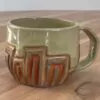 Geometrically carved mug - fire