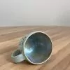 Green mug, masked swirly pattern - Image 4