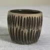 Toffee tumbler with striped carvings