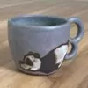 No-energy panda mug, pinkish-green