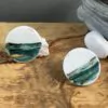 Round sticks with gold and green stripes