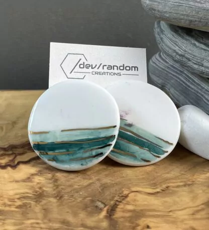 Round sticks with gold and green stripes