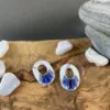 Rounded openwork earrings with white gold stripes - Image 3