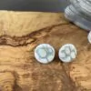 Green round napkin sticks earrings