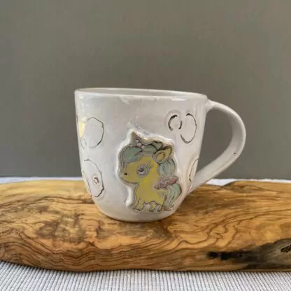 Light blue sparkly unicorn mug "To jest, kurwa, dramat"